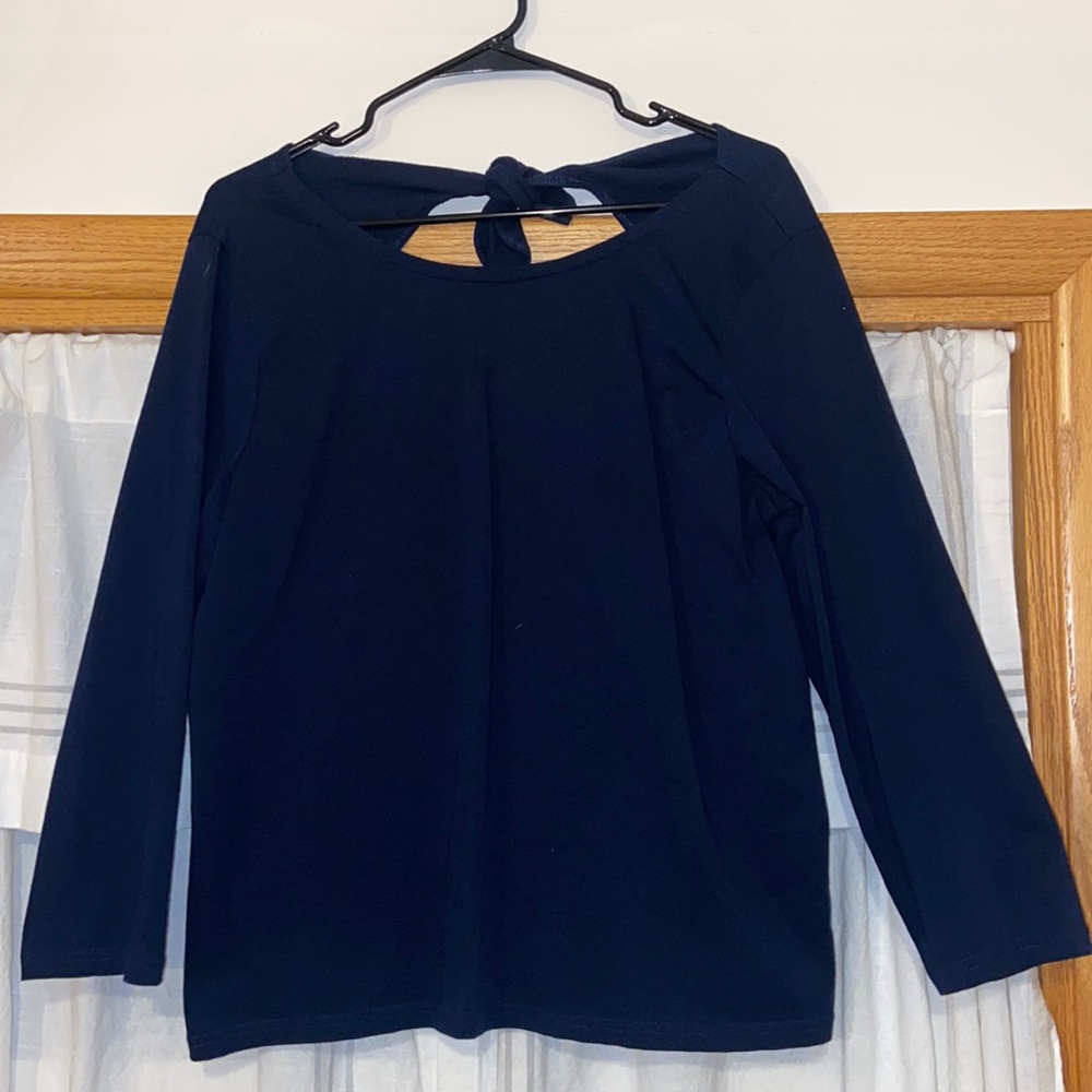 Navy long sleeve with open tie back.